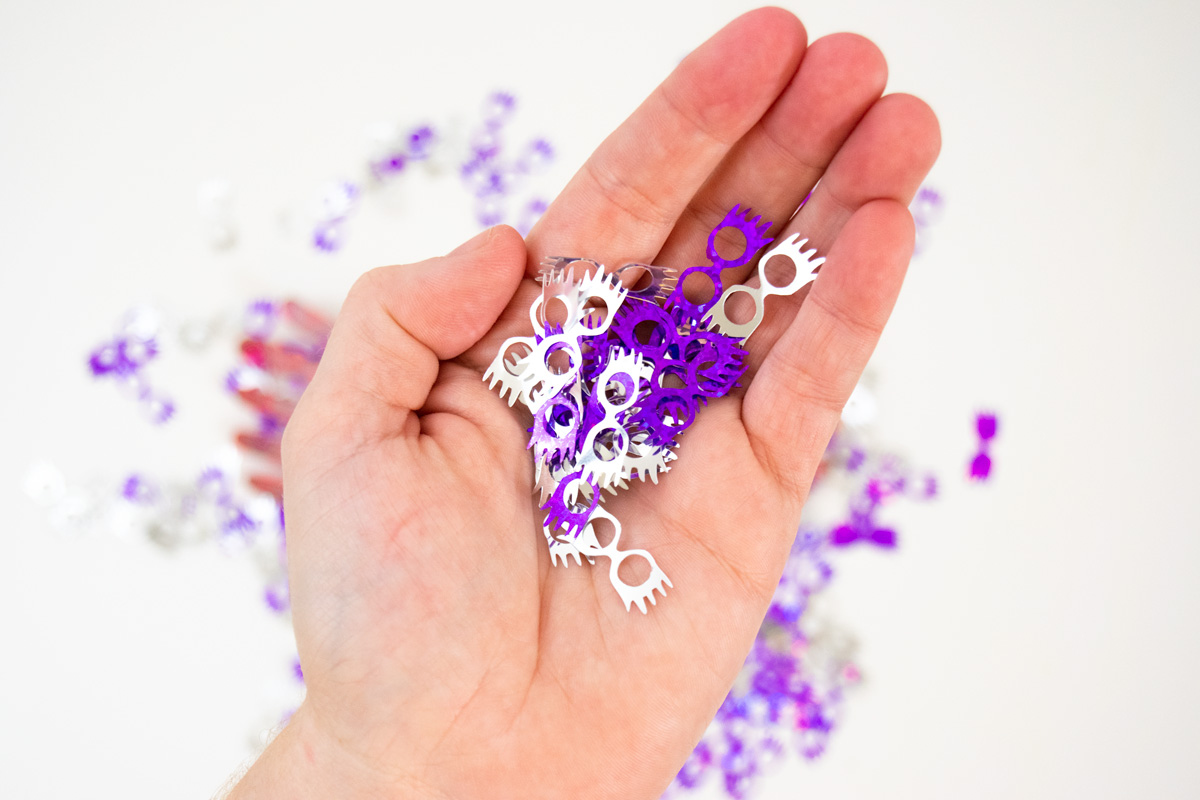diy confetti Have you ever wondered how to cut Cricut Party Foil? Here are all the answers you need to know. Create this Harry Potter party confetti using Luna Lovegood's Sprectrespecs SVG file and create your own Harry Potter party. #harrypotterparty #lunalovegood #cricutmade #cricutpartyfoil